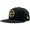 Black New Era cap with gold embroidered Hieroglyphics hip-hop logo on the crown.
