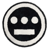 Round area rug with Hiero logo in black and white.