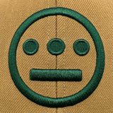 Detailed close up of embroidered Green Hiero logo on two toned brown Mitchell & Ness snapback hat.