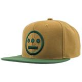 Side angle of two toned brown and green Hiero Mitchell & Ness snapback hat.