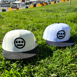 New Era 59FIFTY Hieroglyphics fitted hats photographed outside.