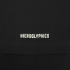 Detailed close-up of white HIEROGLYPHICS wordmark on the sleeve of a black baseball jersey.